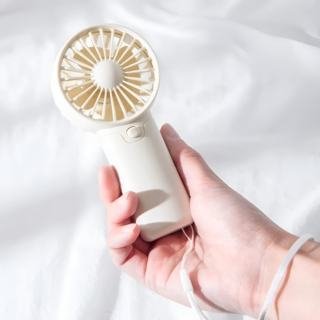 ZenWave Traveler | Portable Mini Fan – Handheld, Battery Powered & Travel-Ready