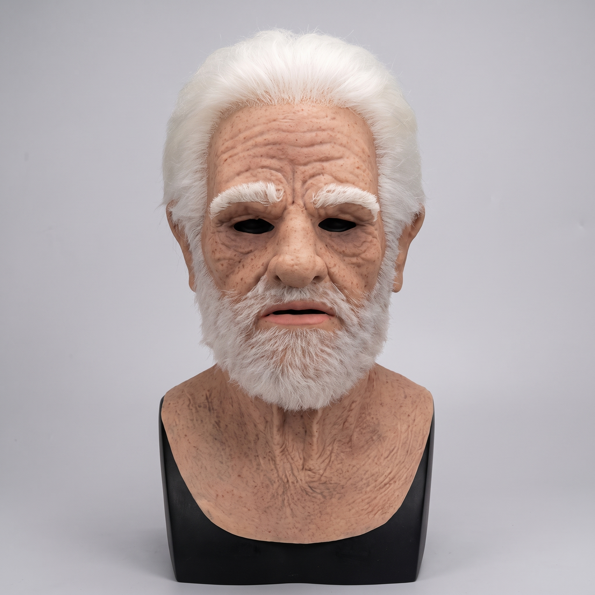 Realistic full face latex Halloween mask on a display stand